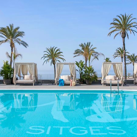 Me Sitges Terramar Hotel Exterior photo The pool at the hotel